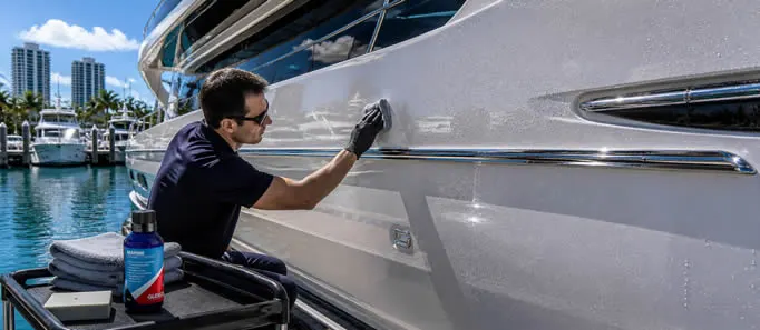 Marine ceramic coating protecting painted motor yacht surfaces in Miami.